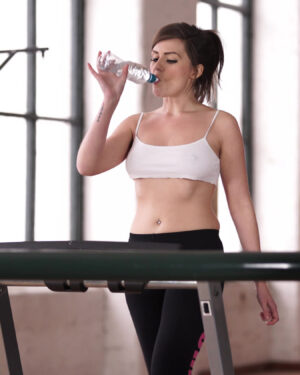 Charlie Rose Braless Exercising