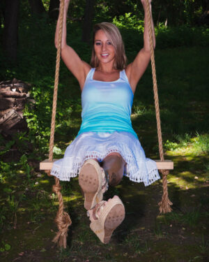 Nikki Sims Swinging Nude