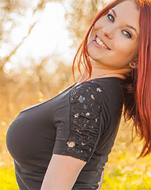 Raven Cute and Busty Redhead